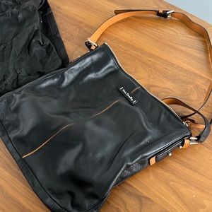 NWOT Vera Bradley black leather crossbody purse. Contrast leather (black/tan)